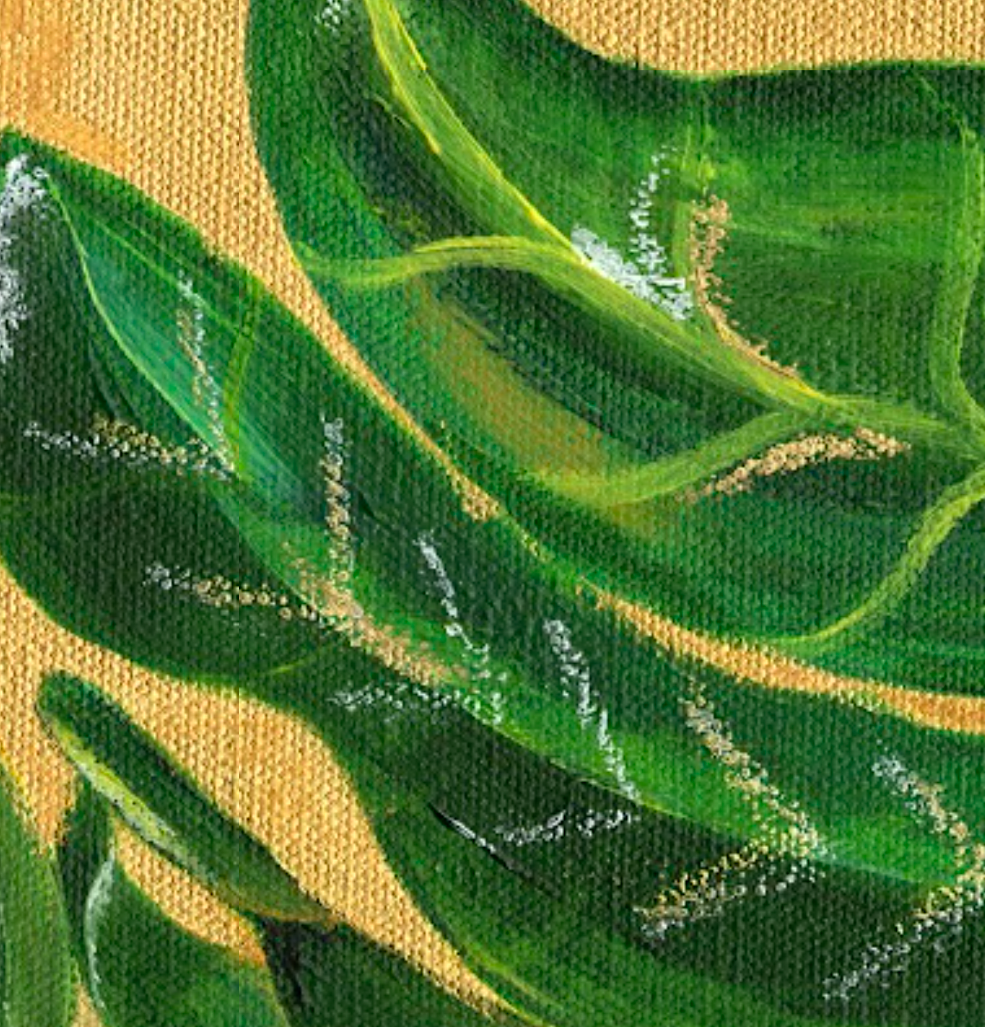 Close-up of green fabric with gold accents on a beige background