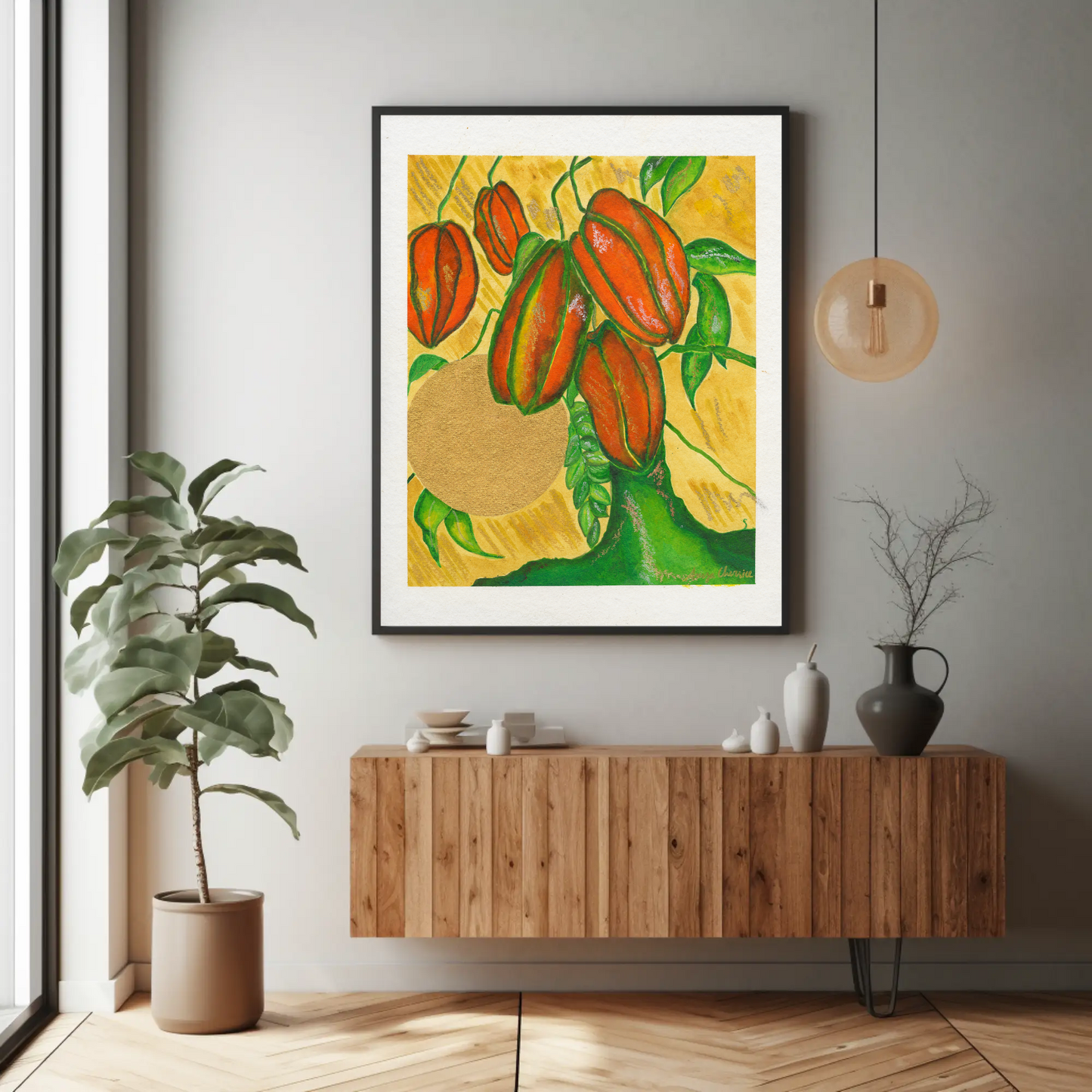 Star Fruit Art Print in a black frame above a wooden console table by Anya Cherrice